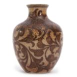 19th century Martinware vase, the beige body with a trailing incised design of dark brown leaves,