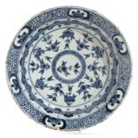 Mid-18th century English Delft dish decorated in blue and white with a Chinese Kangxi porcelain