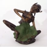 Modern patinated bronze case metal study of an elf holding a lily pad, 43cm high