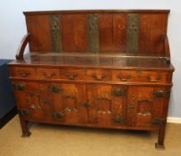 Arts & Crafts oak sideboard applied with hammered metal panels throughout, the pediment applied with