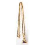 Designer made mid-grade yellow metal tanzanite and diamond pendant, suspended from a Belcher link