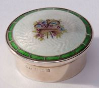 Edwardian small circular lidded box, the push on lid with guilloche enamel top, the centre featuring