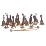 Boxed set of 15 19th century campanologist's brass and leather mounted hand-bells, Mears-London,