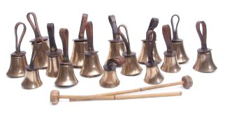 Boxed set of 15 19th century campanologist's brass and leather mounted hand-bells, Mears-London,