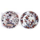Two 18th century Chinese porcelain plates, one in a Wucai palette, the other decorated in Chinese