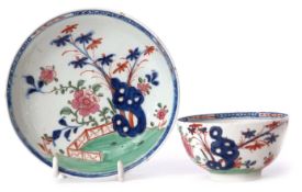 Lowestoft porcelain tea bowl and saucer circa 1780, decorated with the Redgrave pattern, the