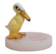 Royal Doulton model of a novelty duck mounted on an onyx ashtray, the duck with factory mark to