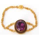 Victorian Etruscan Revival amethyst set bracelet, the large oval faceted amethyst 20mm x 15mm,