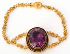 Victorian Etruscan Revival amethyst set bracelet, the large oval faceted amethyst 20mm x 15mm,