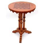 Burr walnut or satinwood circular pedestal games table inlaid with chequerboard top over three