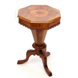 Victorian walnut pedestal work table lifting lid enclosing a plush lined fitted interior, pedestal