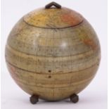 Unusual Huntley & Palmers Biscuit tin in the form of a globe, raised on four acorn type feet, the