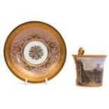 Early 19th century Vienna topographical cabinet cup and saucer, the cup with title to base, "Vue