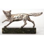 Early 20th century cast silver model of a running fox on green marble forming a paperweight, 15cm