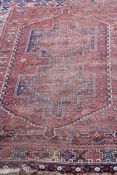 Early 20th century Caucasian rug, multi-gull border with central panel of two interlinked