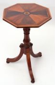 Ornate pedestal table, octagonal top inlaid with radiating exotic wood panels on a ring turned and