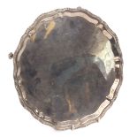 Elizabeth II salver of shaped circular form with cast and applied Celtic border to a polished