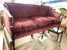 EDWARDIAN MAHOGANY THREE SEATER SOFA WITH RED CUSHIONS AND REEDED LEGS