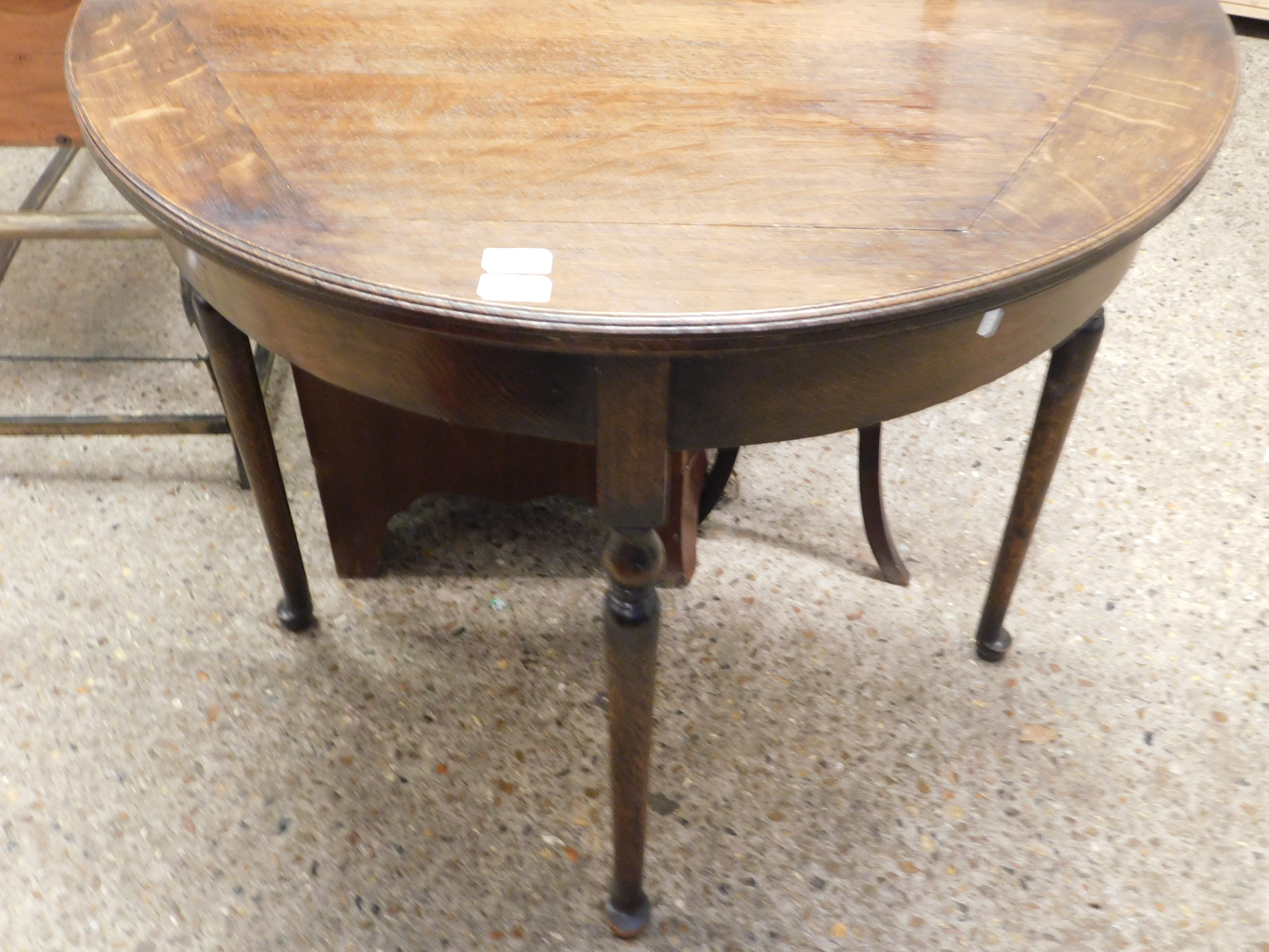 OAK FRAMED DEMI-LUNE FOLD OVER CARD TABLE WITH GREEN BAIZE LINED INTERIOR ON FOUR TURNED LEGS