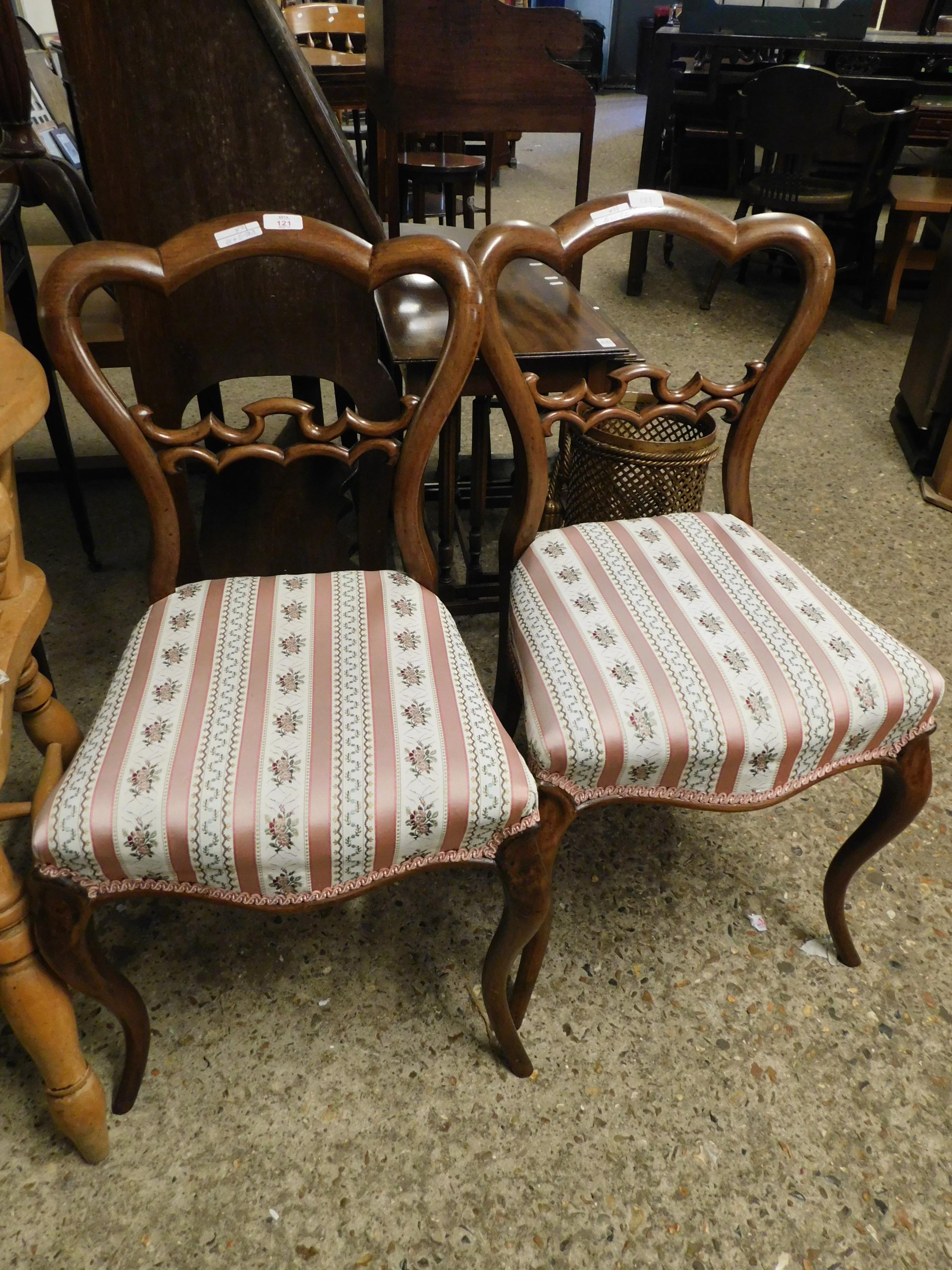 PAIR OF MAHOGANY SHAPED BACK DINING CHAIRS WITH DECORATIVE BARS ON CABRIOLE FRONT LEGS