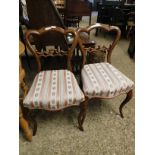 PAIR OF MAHOGANY SHAPED BACK DINING CHAIRS WITH DECORATIVE BARS ON CABRIOLE FRONT LEGS