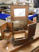 19TH CENTURY OAK SMOKER'S COMPENDIUM WITH LIFT UP TOP WITH INSET MIRROR AND OPENING COMPARTMENTS AND