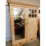 PINE FRAMED DOUBLE DOOR WARDROBE, ONE WITH A MIRROR AND ONE WITH SIX GLASS PANELS INSET WITH TWO
