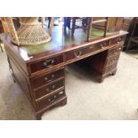 REPRODUCTION MAHOGANY TWIN PEDESTAL DESK WITH NINE DRAWERS WITH BRASS SWAN NECK HANDLES RAISED ON