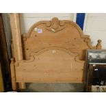 WAXED PINE DOUBLE BED WITH CARVED HEADBOARD AND SIDE RAILS