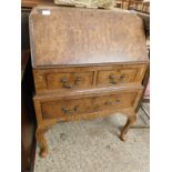 QUEEN ANNE STYLE WALNUT DROP FRONTED BUREAU WITH TWO DRAWERS OVER FULL WIDTH DRAWER ON SHAPED PAD