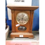 OAK FRAMED MANTEL CLOCK WITH SILVERED DIAL