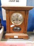 OAK FRAMED MANTEL CLOCK WITH SILVERED DIAL