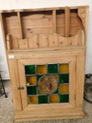 PINE FRAMED WALL MOUNTED CABINET WITH STAINED GLASS DOOR AND A FURTHER TWO TIER WALL MOUNTED