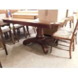 VICTORIAN MAHOGANY PEDESTAL DINING TABLE OF RECTANGULAR FORM WITH ROUNDED CORNERS OVER A PLAIN