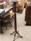 MAHOGANY TORCHERE STAND, CIRCULAR TOP ON A REEDED COLUMN TERMINATING IN A QUADRUPED BASE, 137CM HIGH