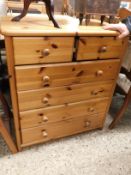 PINE FRAMED TWO OVER FOUR FULL WIDTH DRAWER CHEST WITH TURNED KNOB HANDLES