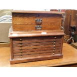 OAK FRAMED LIFT UP TOP CANTEEN BOX WITH TWO DRAWERS TOGETHER WITH A MAHOGANY FRAMED SEVEN DRAWER