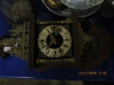 DUTCH OR VIENNA STYLE WALL CLOCK WITH SILVER DIAL AND METAL DECORATION ABOVE