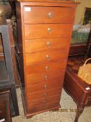 BEECHWOOD TEN-DRAWER PILLAR CHEST WITH RINGLET HANDLES