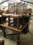 OAK FRAMED DRAW LEAF DINING TABLE ON BARLEY TWIST SUPPORTS AND X-STRETCHER TOGETHER WITH FOUR