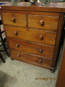 19TH CENTURY MAHOGANY STRAIGHT FRONTED TWO OVER THREE FULL WIDTH DRAWER WITH TURNED KNOB HANDLES