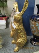 GILT SEATED RESIN MODEL OF A HARE