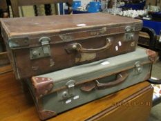 LEATHER VINTAGE SUITCASE AND A SMALLER ONE, AND A FURTHER HESSIAN AND LEATHER CASE (3)