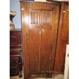 GOOD QUALITY OAK FRAMED SINGLE DOOR WARDROBE WITH CARVED DETAIL