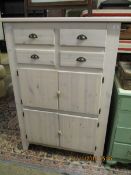 WHITEWASHED PINE FRAMED CUPBOARD WITH FOUR DRAWERS AND FOUR CUPBOARD DOORS