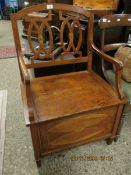 MAHOGANY FORMED BOX CHAIR WITH OPEN WORK BACK AND SCROLL ARMS WITH LIFT UP SEAT WITH INLAID PANEL