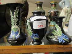 THREE SHELLEY BLACK AND FLORAL SQUAT VASES