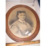 OVAL FRAMED REPRODUCTION PICTURE OF A YOUNG GIRL