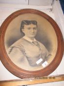 OVAL FRAMED REPRODUCTION PICTURE OF A YOUNG GIRL