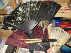 COLLECTION OF TWO LATE 19TH CENTURY FANS, THE COMPOSITE BODIES WITH PAPER DECORATION OF FLOWERS WITH